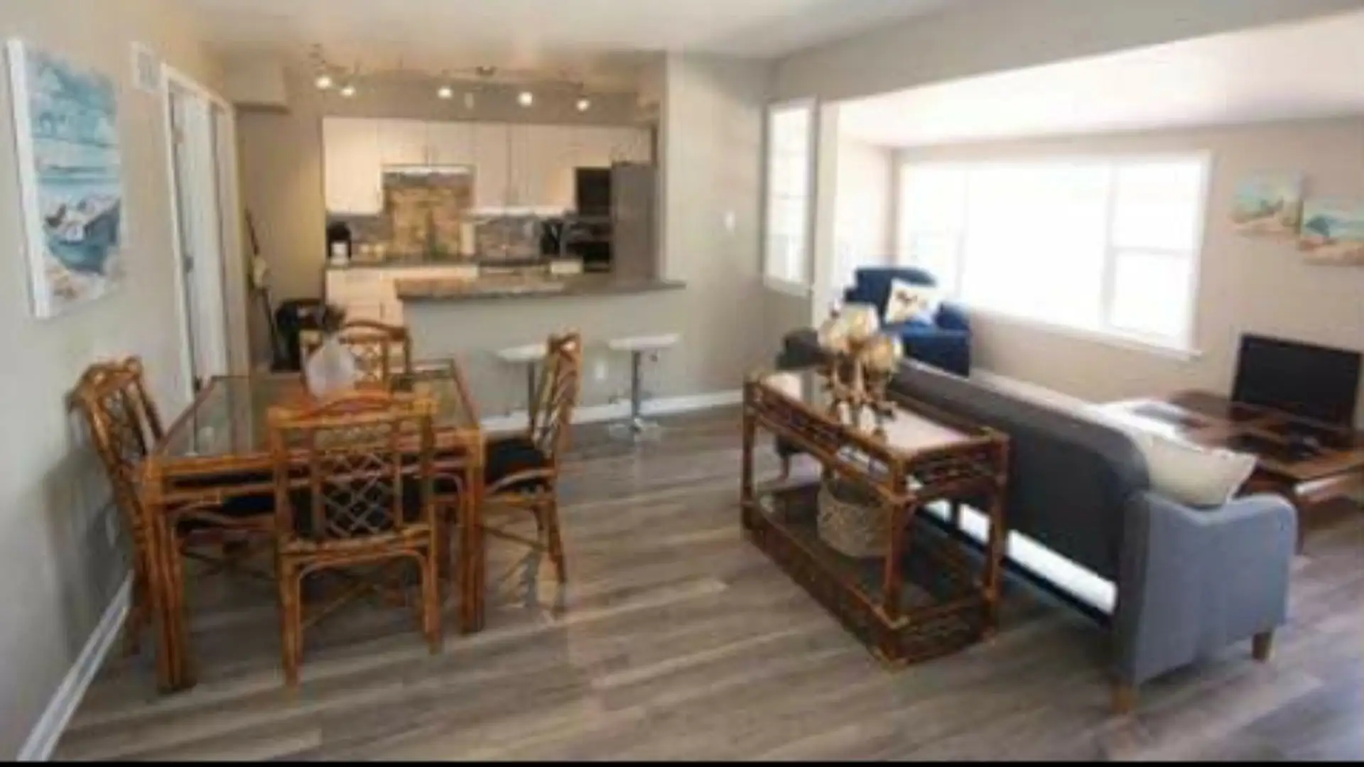 Condo rental interior with kitchen, dining, and lounge