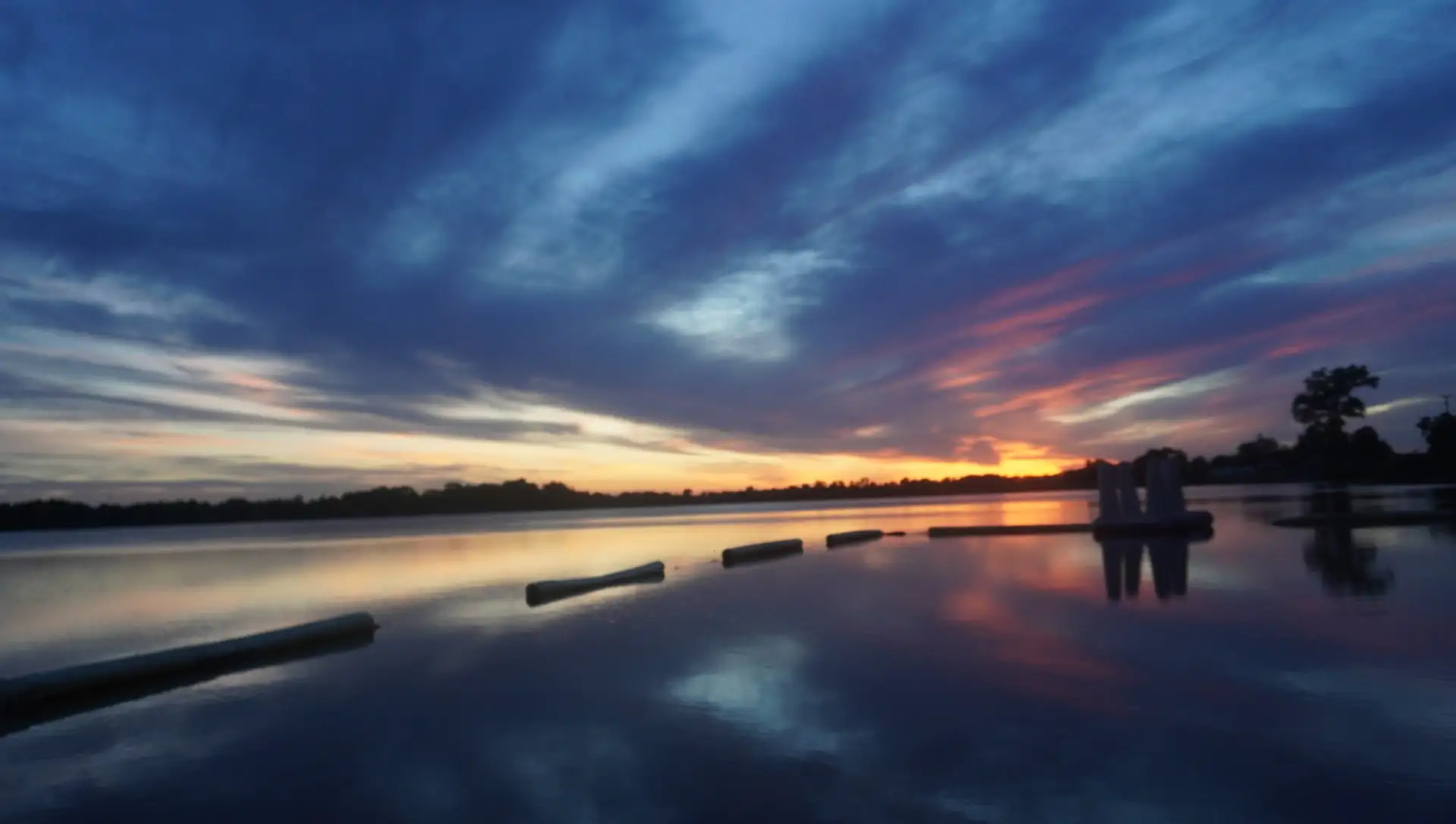 Blue-hour afterglow over the swim area